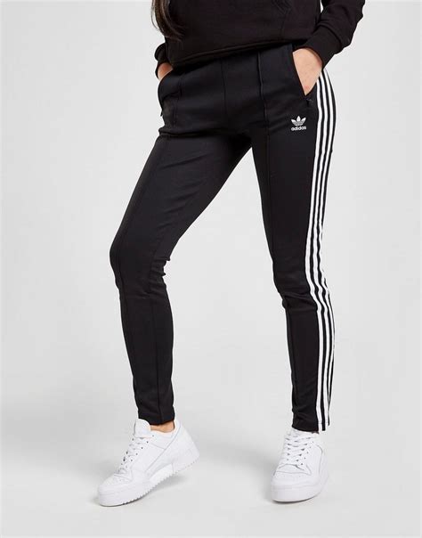 een wat strakkere adidas trainingsbroek dames|Adidas Originals Trainingsbroeken voor dames online kopen.